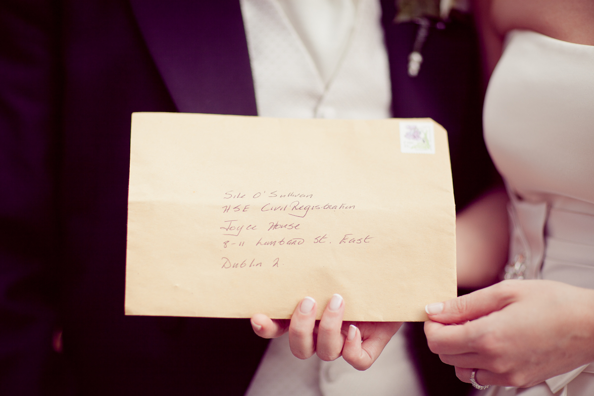 bride groom posting wedding certificate